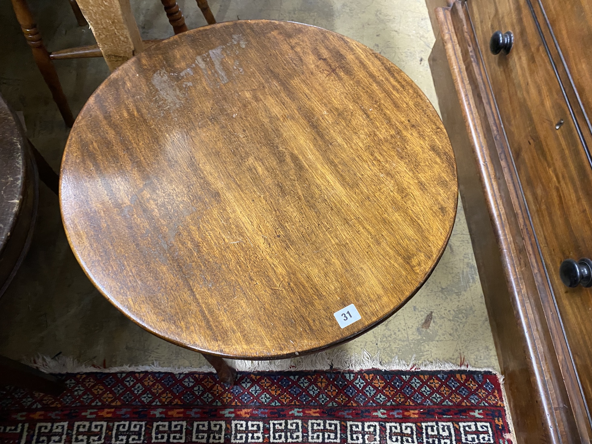 A pair of circular mahogany and beech occasional tables, diameter 61cm, height 46cm